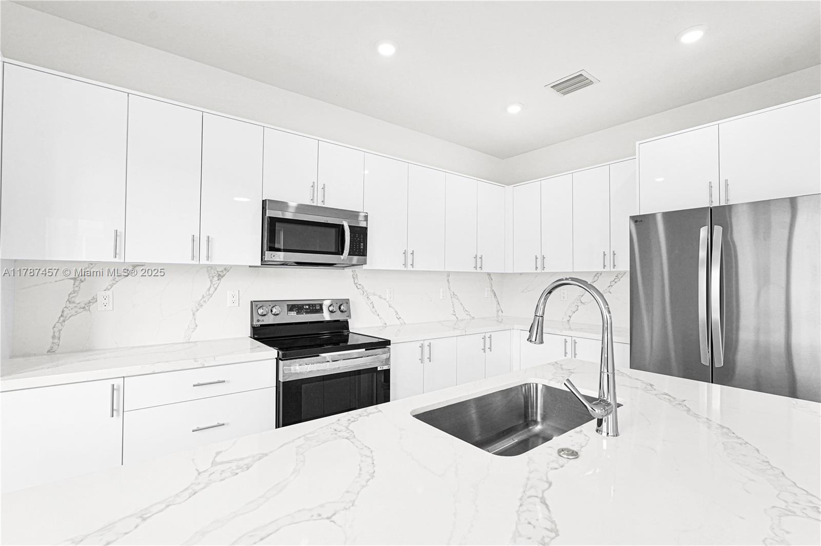 BUILDERS PAYING ALL CLOSING COSTS AND PRE-PAIDS, JUST BRING YOUR DOWN PAYMENT. Discover exceptional value with Chloe's Estates, where spacious twin homes offer 2,500 sq. ft. of living space. Choose from two unique models designed for comfort and privacy, featuring high-end finishes like stainless steel appliances, quartz countertops, and 32x32 rectified tiles. Enjoy high ceilings, waterproof vinyl flooring on the second floor, and large backyards big enough for a pool. Conveniently located near shopping, the Florida Turnpike, and US1, these homes provide the perfect blend of space, style, and accessibility—setting a new standard for quality living in South Florida.