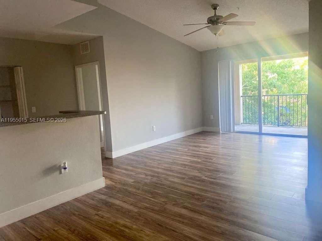 Photo of 7930 N Nob Hill Rd #304, Tamarac, FL 33321 (MLS # A11955015)