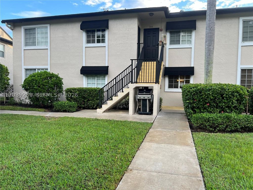 Photo of 4000 Crystal Lake Dr #111, Deerfield Beach, FL 33064 (MLS # A12039281)