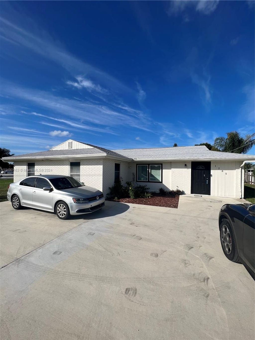 Photo of 1285 SE Port St Lucie Blvd, Port Saint Lucie, FL 34952 (MLS # A11490163)