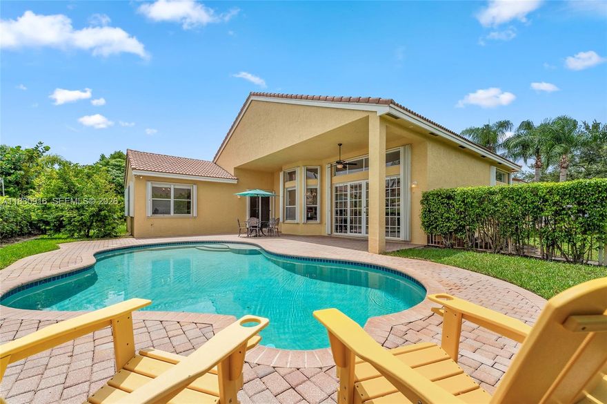 Experience resort-style living in the prestigious Isles of Sunset Lakes. This beautifully maintained 5 bed / 3 bath home offers a spacious single-story layout designed for comfort and elegance. Features include his & her bathrooms with a pass-through shower, walk-in closets, and a chef’s kitchen with double ovens. Bright, open living spaces flow seamlessly to the outdoor covered patio, lush landscaping, and a private pool—perfect for year-round enjoyment. Enjoy peace of mind in this gated community with a clubhouse, fitness center, playgrounds, and more.