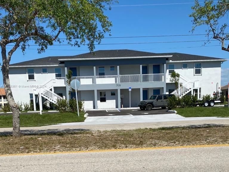 Discover a prime investment opportunity in Cape Coral, FL! This stunning multifamily building, constructed in 2021, features six fully rented units with modern amenities and an unbeatable location. The property offers two unit types, (2) 2-bedroom, 2-bath units with 1,051 sq. ft. and (4) 2-bedroom, 2-bath units with a den and 1,139 sq. ft. Granite countertops, stainless steel appliances, washer/dryer and hard flooring throughout. Located on a canal with 12 parking spaces for tenant convenience. Proximity to lifestyle essentials such as schools, shopping centers, restaurants, entertainment, gyms, and parks. Situated just off Nicholas Parkway and Pine Island Road, this two-story property ensures excellent access and convenience. Don’t miss out on this meticulously maintained building.