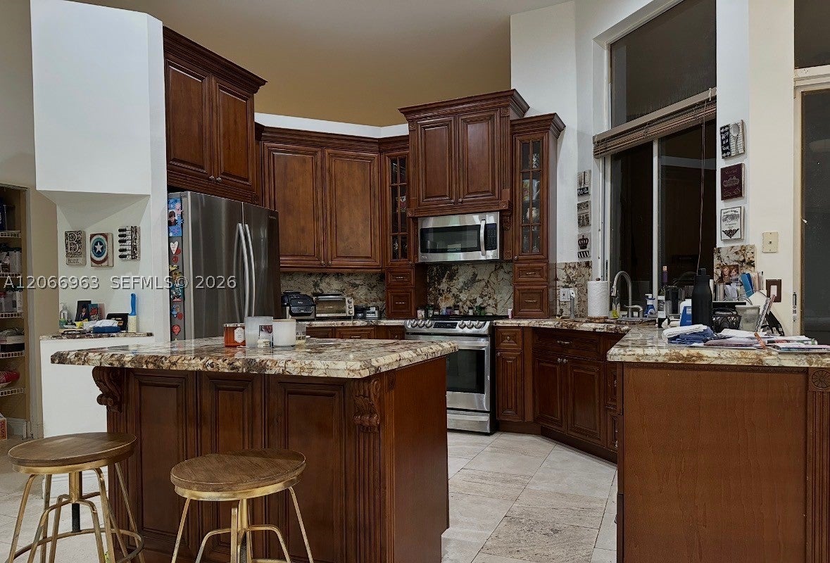 966 Spoonbill Cir, Weston FL 33326