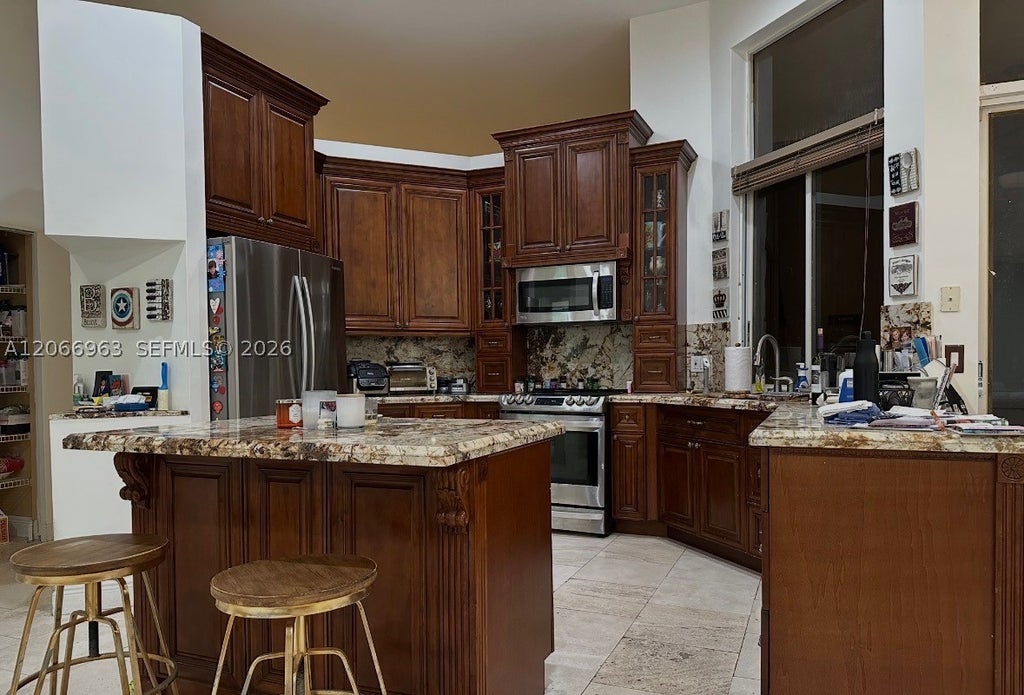Photo of 966 Spoonbill Cir, Weston, FL 33326 (MLS # A12066963)