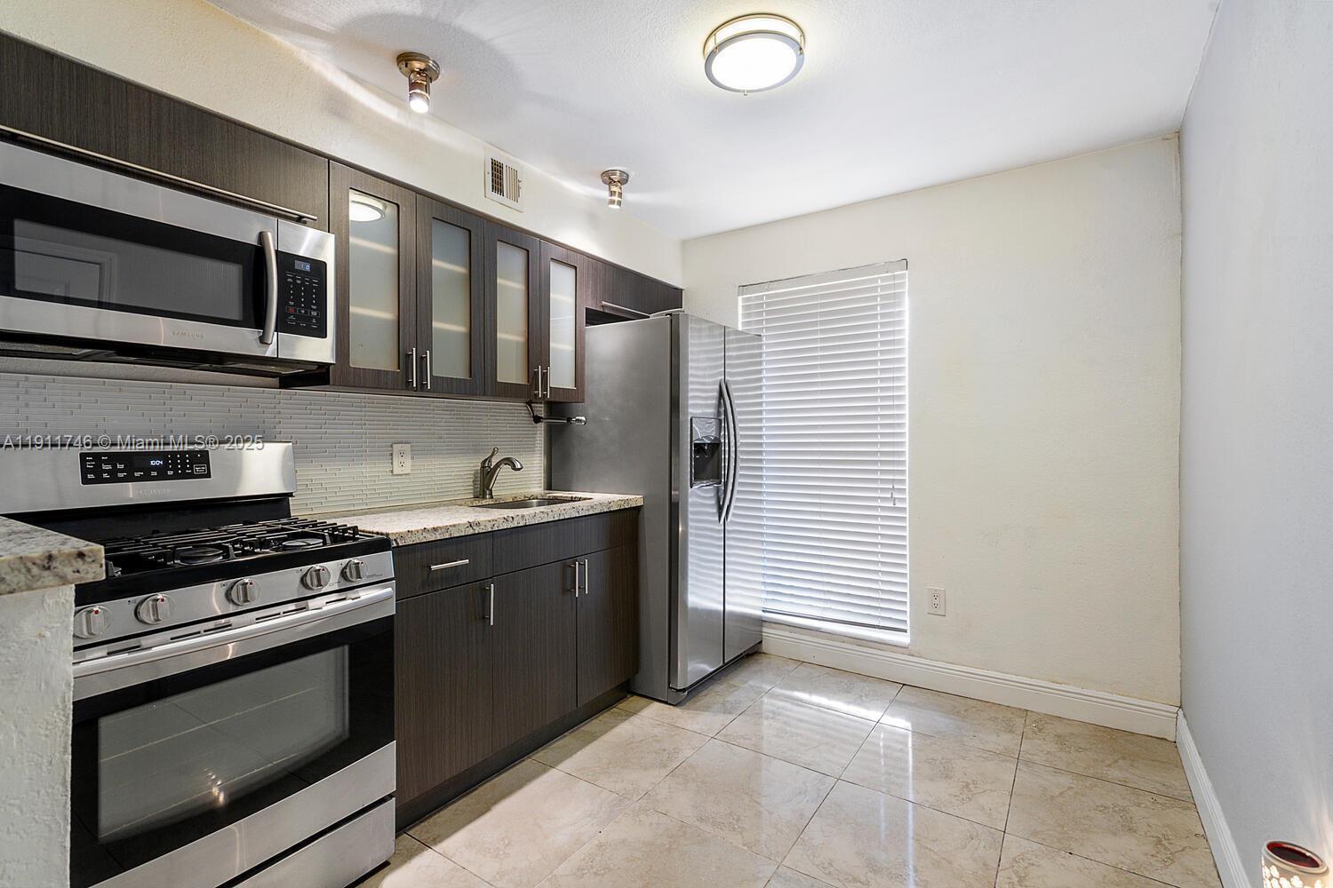 241 S Royal Poinciana Blvd 206