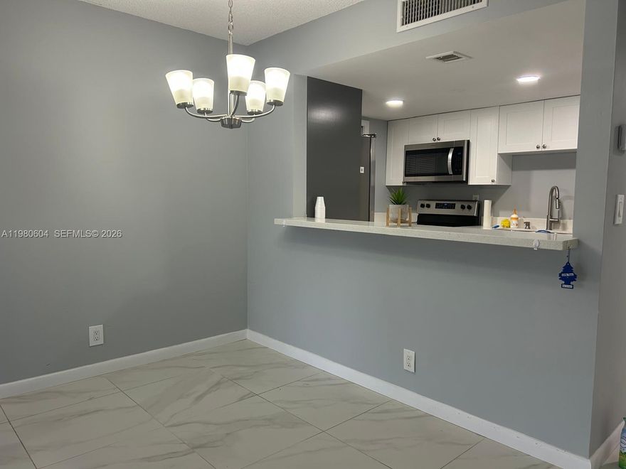 2-Bed, 2-Bath Apartment in Weston! Bright and airy unit with ample bedrooms, a remodeled bathroom, new kitchen w/ new appliances. Newer A/C system for your comfort. The building features a secure lobby with intercom entry, an elevator for easy access, and a refreshing pool. Access to the Bonaventure Town Center Club for only $470 a year, offering amenities like tennis, a gym, sauna, pools and more. Large Washer & Dryer in Unit. NO SPECIAL ASSESSMENTS (all paid). You CAN RENT the unit after 3 months of buying it.