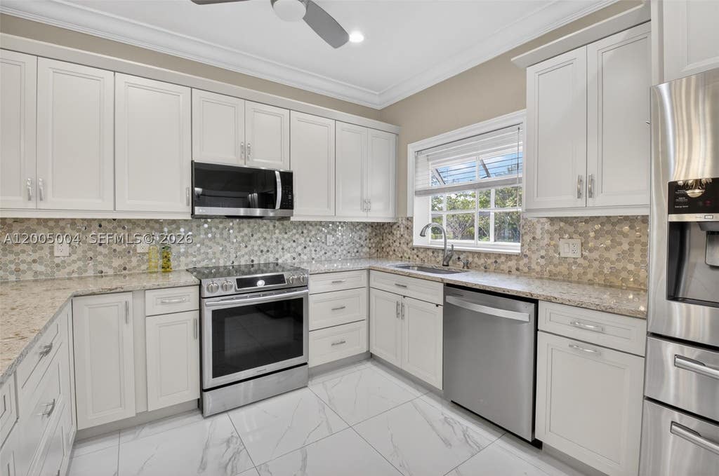 Photo of 11538 Briarwood Cir #4, Boynton Beach, FL 33437 (MLS # A12005004)