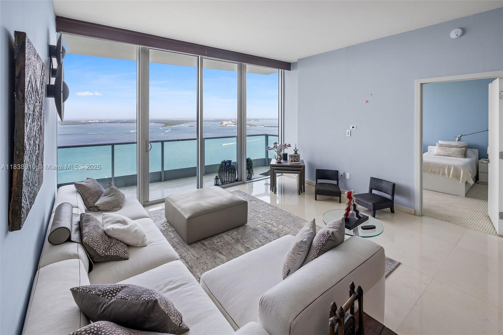 Luxurious & fully furnished 2 Bedroom + Den condo with unobstructed water views at the Jade Brickell. Enjoy direct ocean views from the living room & both bedrooms. This unit has a private elevator opening into a private foyer for the residence. Each bedroom has an en-suite bath, the separate den also has an en-suite bath. 10-foot ceilings and automatic blinds. Building amenities: Secure entry, private elevators, 24-hour valet, bayfront pool, fitness center with pilates & spa, business center & rooftop clubroom. Located on quiet Brickell Bay Drive within easy walking distance to Brickell. FULLY FURNISHED.