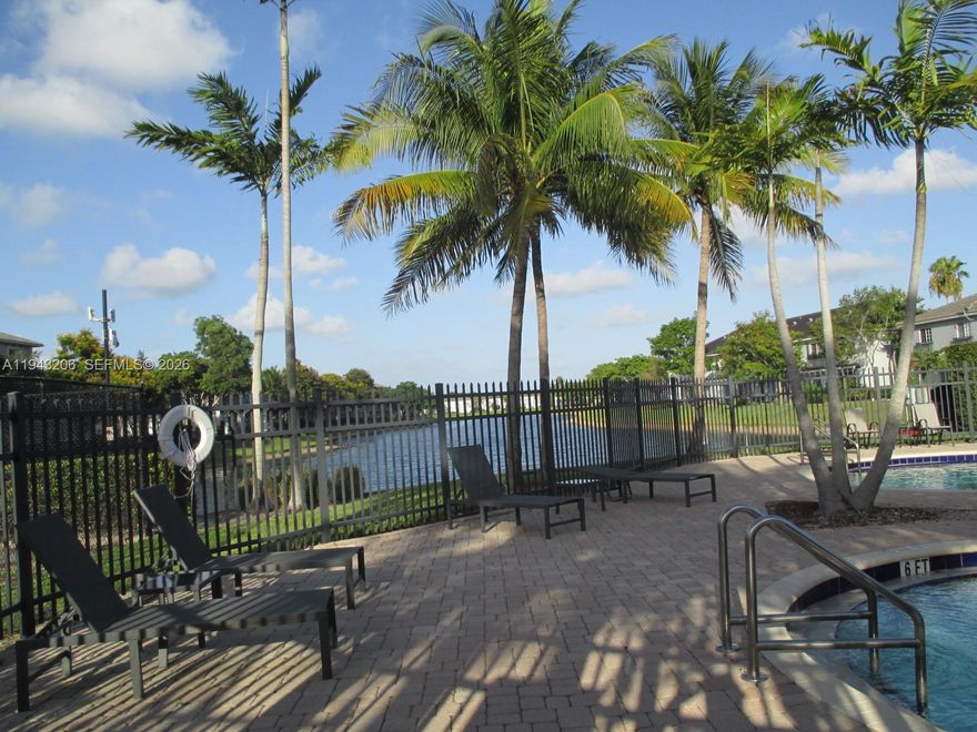 Welcome to your dream townhome in the heart of Lauderhill! This stunning property boasts 3 spacious bedrooms, 2 ½   bathrooms, and a convenient 1 car garage. The modern kitchen features granite counters, stainless steel appliances, and ample storage space for all your culinary needs. The open concept living and dining area is perfect for entertaining guests or relaxing with your loved ones. The master suite has a splendid lake view, with a walk-in closet and a beautifully appointed end-suite bathroom.