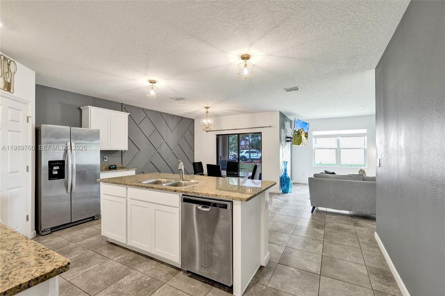 Newer construction in St. Andrews Preserve. This single-story home offers 4 bedrooms, 2 bathrooms, and a 2-car garage with an open layout designed for comfortable everyday living. Features include a spacious family room, dining area, island kitchen, split-bedroom floor plan, covered outdoor space, and a private primary suite with a walk-in closet, dual sinks, and a separate shower. Located in a gated community with an HOA and convenient access to shopping, dining, and major roadways. All measurements and information are approximate and should be independently verified by the buyer.