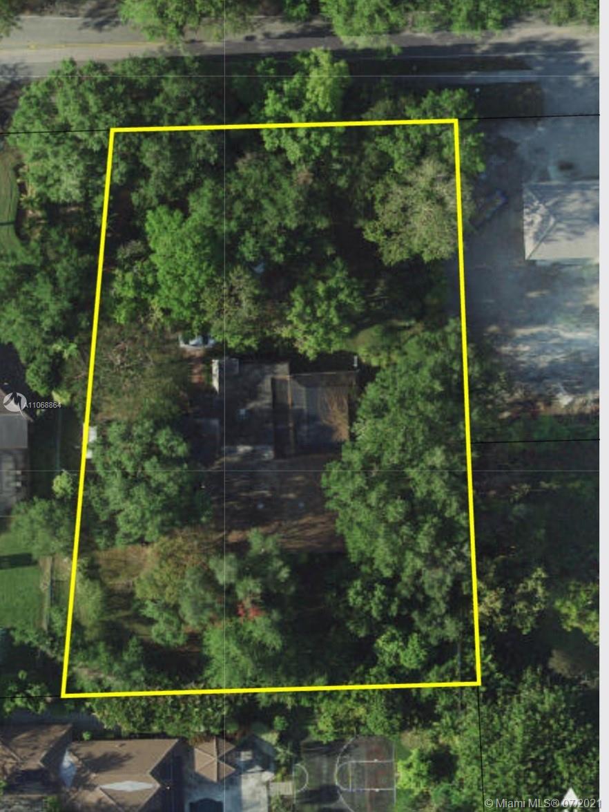 Amazing deep rectangular lot (239 feet deep, +38,000 sq feet) in Pinecrest ready to be developed. Property is surrounded by multimillion dollar homes.  While plans are being designed and permitted you can rent out current residence for $4,500 a month.  Situated in the heart of Pinecrest, the best schools in Pinecrest are just minutes away.  Great opportunity to develop or build your dream home