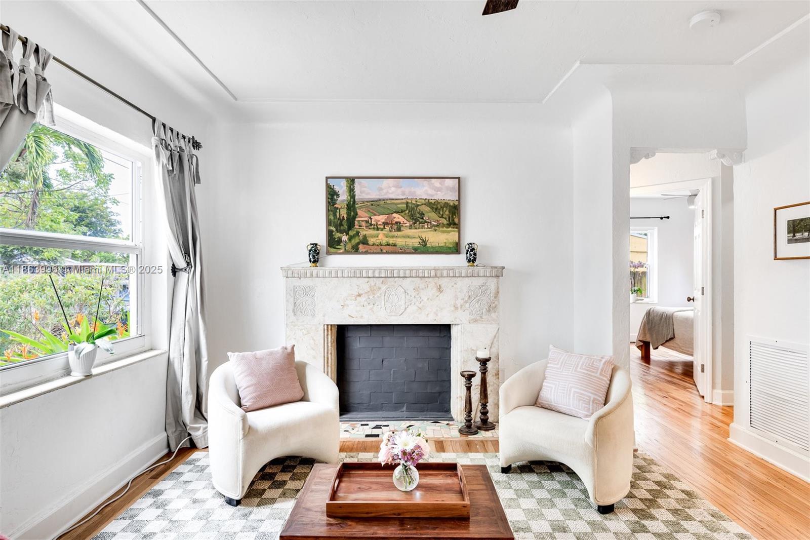 Your new home awaits in the sought-after Buena Vista West neighborhood. This 2-bedroom gem is full of character, with original details like gleaming oak floors and elegant arched spandrels. Just steps from the Design District, Midtown, and Wynwood, it blends history with modern convenience. Enjoy a lush native garden in your private backyard oasis, or relax in the sunroom where sliding French doors seamlessly connect the indoors and out—perfect for quiet afternoons or lively gatherings.