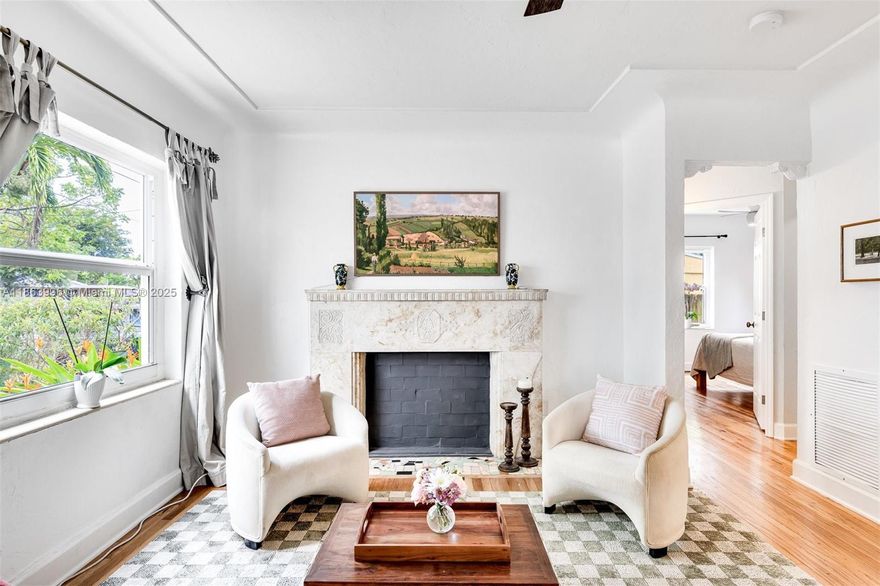 Your new home awaits in the sought-after Buena Vista West neighborhood. This 2-bedroom gem is full of character, with original details like gleaming oak floors and elegant arched spandrels. Just steps from the Design District, Midtown, and Wynwood, it blends history with modern convenience. Enjoy a lush native garden in your private backyard oasis, or relax in the sunroom where sliding French doors seamlessly connect the indoors and out—perfect for quiet afternoons or lively gatherings.