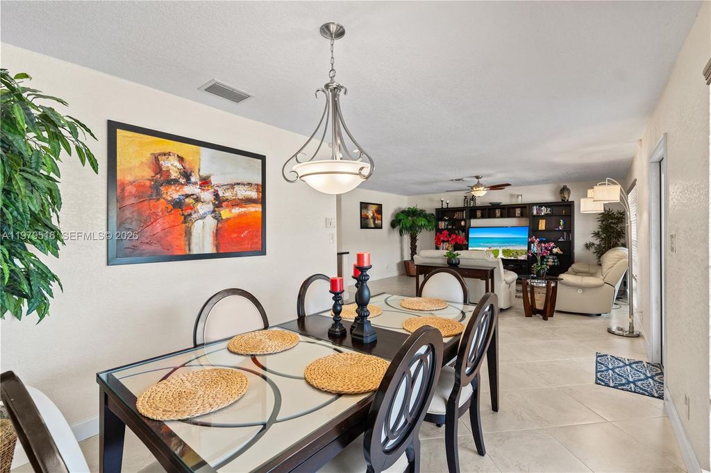 Photo of 9136 NW 32nd Pl, Sunrise, FL 33351 (MLS # A11979516)