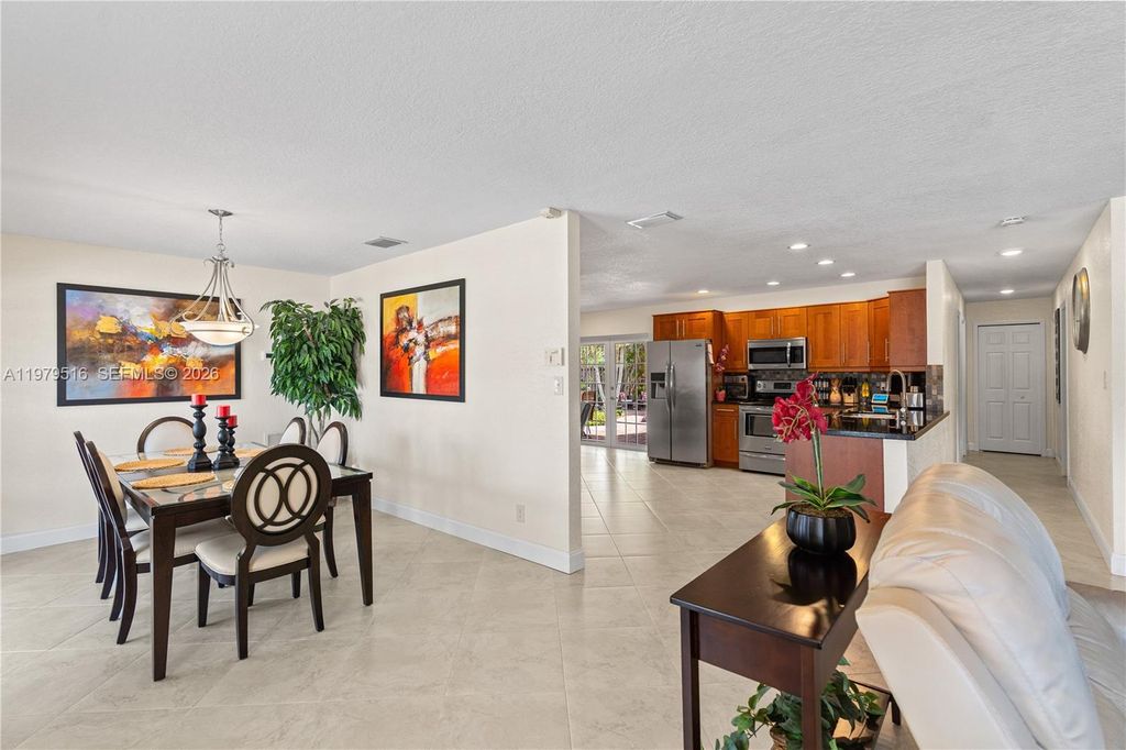 Photo of 9136 NW 32nd Pl, Sunrise, FL 33351 (MLS # A11979516)