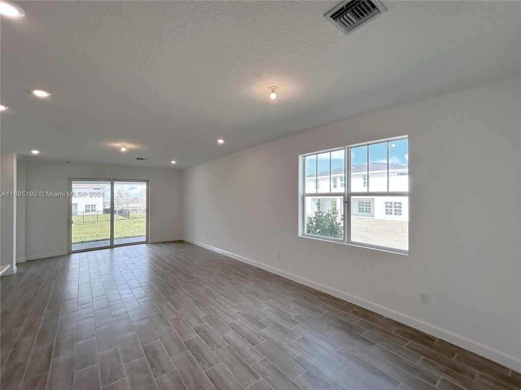 Photo of 1459 Tangled Orchard Trce, Loxahatchee, FL 33470 (MLS # A11695190)