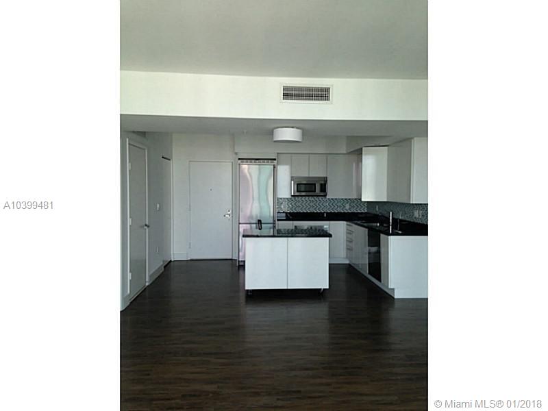 Enjoy this amazing and WATERFRONT PANORAMIC views from this 50th floor, 2 beds+2baths, stainless steel
appliances, large balcony, wood like floors, California closets and shades. GATED community and WALKING
DISTANCE to Mary Brickell Village. 5 star ameni ties including pool, fitness center spa, clubhouse, 24 hours
front desk and valet. Unit occupied until 12/16/2015.