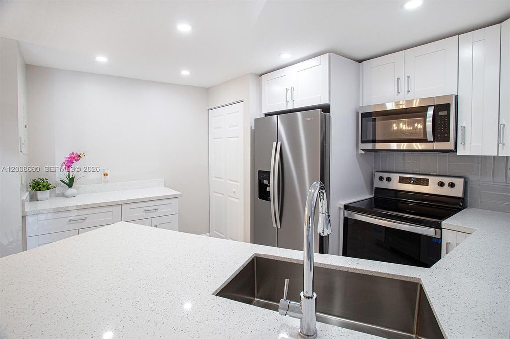 Photo of 7527 S Oriole Blvd #101, Delray Beach, FL 33446 (MLS # A12008680)
