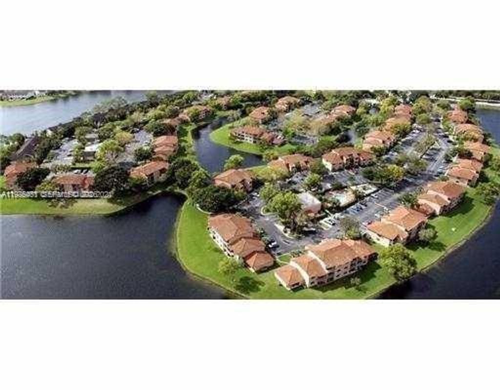 Photo of 9831 Nob Hill Ct #9831, Sunrise, FL 33351 (MLS # A11985461)