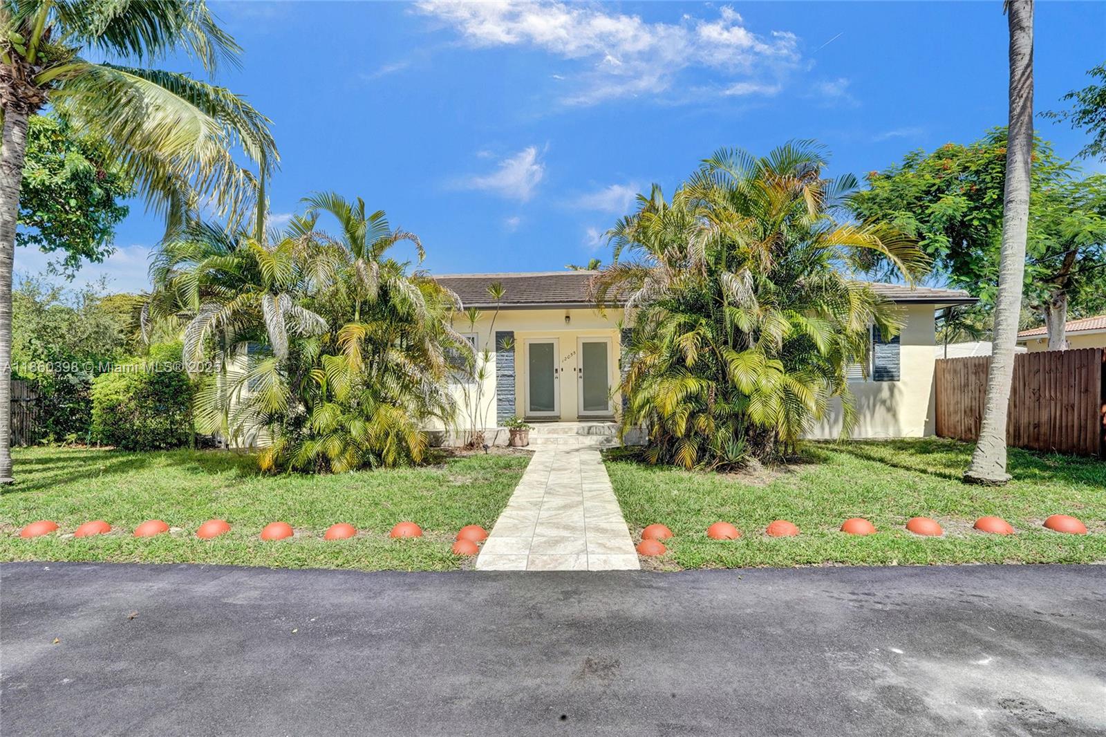 Discover this stunning 2 bedrooms and 1 bathroom! this property is equipped with hurricane impact windows and doors ensuring maximum security during storm season. Showcases a modern full kitchen, ideal for your culinary adventures along with convenient in-unit laundry Step outside to enjoy a large garden/patio, perfect for relaxation or entertaining friends and family Additionally, you'll appreciate the exclusive parking available This duplex provides a wonderful living space but also presents an incredible investment opportunity in a vibrant community the possibilities are endless!