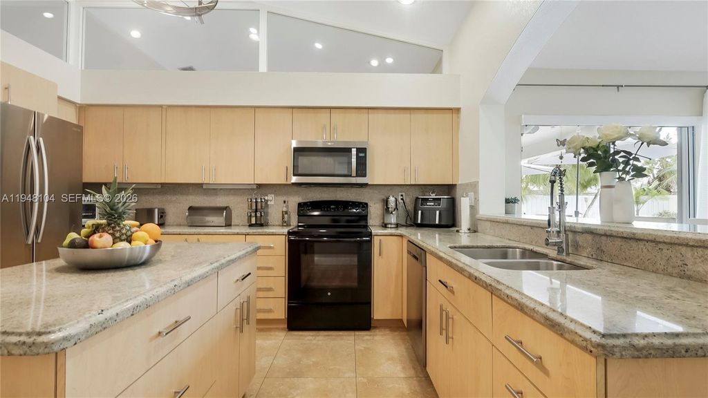 Photo of 13310 NW 11th Ln, Sunrise, FL 33323 (MLS # A11948104)