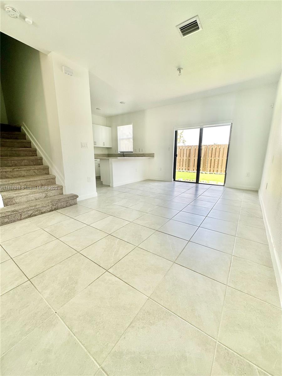 10049 SW 228th Ter .