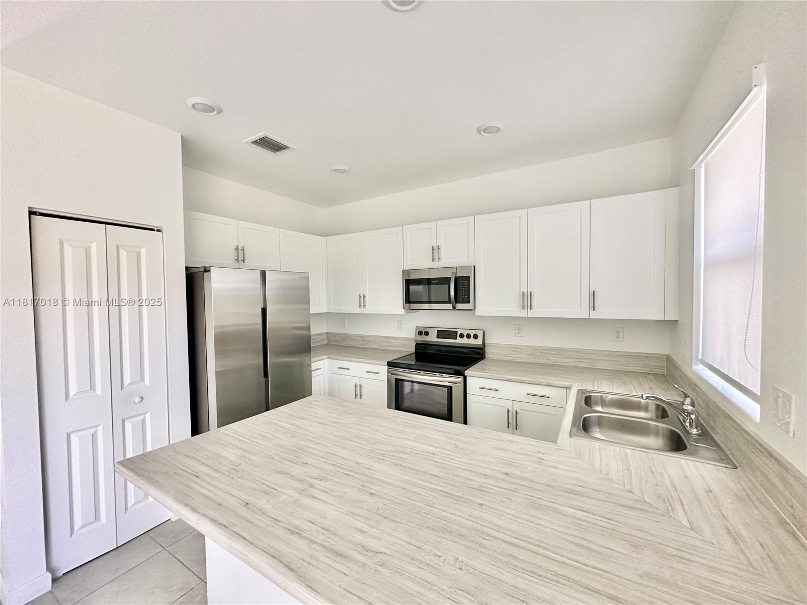10049 SW 228th Ter .