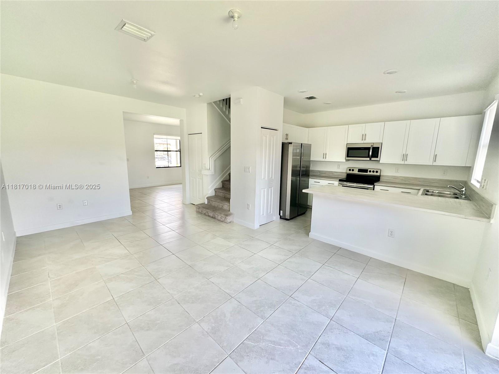 10049 SW 228th Ter .