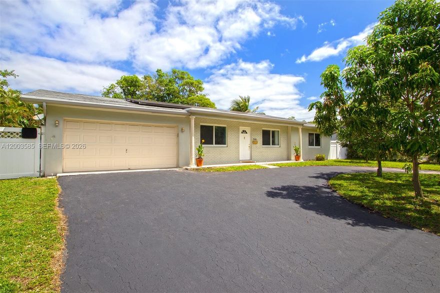 WELCOME HOME TO YOUR BEAUTIFUL PLACE OF ABODE. IMAGINE YOURSELF INDULGING IN A LARGE POOL HOME WITH SEVERAL FRUIT TREES AND 2 CAR GARAGE WITH A CIRCULAR DRIVEWAY IN THE TRANQUIL NEIGHBORHOOD OF PLANTATION. STEP INSIDE YOUR WELL MAINTAINED QUIET AND PEACEFUL HOME FEATURING ALL IMPACT WINDOWS, AND SLIDING DOORS WITH IN-CEILING LIGHTING AND BRIGHT VINYL FLOORING. LARGE SPLIT BEDROOM LAYOUT WITH SEPARATED PRIMARY BEDROOM, ALL WALK-IN CLOSETS AND CEILING FANS THROUGHOUT YOUR HOME. LARGE LIVING AND SEPARATE DINING ROOM FOR FAMILY & FRIENDS SPECIAL OCCASSIONS. EVEN TAKE YOUR GUEST TO THE COVERED PATIO FOR BARBECUE AND SOCIAL GATHERINGS. SERVE MEALS AND DRINKS FROM THE CHEF WINDOW IN YOUR SPACIOUS AND CLEAN KITCHEN WITH TALL CABINETS AND NEWER STAINLESS STEEL KITCHEN APPLIANCES WITH MARBLE COUNTERTOPS. ADULTS AND CHILDREN WILL BE FULLY ENGULFED IN YOUR SPACIOUS FAMILY AND ENTERTAINMENT ROOM ADJACENT TO THE KITCHEN AND PATIO. ENJOY YOUR LARGE OUTDOOR POOL WITH OUTDOOR SHOWER AND SURROUNDED BY TALL FRUIT TREES FOR SHADE WHILE UNWINDING FROM A LONG DAY OR SIMPLY RELAXING WITH A COOL DRINK AND SNACKS.  THIS HOME COMES WITH A FULL SIZE FULLY PAID $30K SOLAR PANEL SYSTEM FOR MAXIMUM SAVINGS ON YOUR FPL BILLS. NEW ROOF 2023, NEW WATER HEATER 2025, HVAC NEST A/C 2017, MICROWAVE AND DISHWASHER 2024, NEWER WASHER/DRYER IN THE SPACIOUS GARAGE. THERE ARE NO HOA AND YOU CAN EXPAND THIS HOME TO A MANSION. SELLERS ARE DOWNSIZING AND  PRICED TO SELL FAST ! RUN TO THIS GEM, IT WON'T LAST LONG..