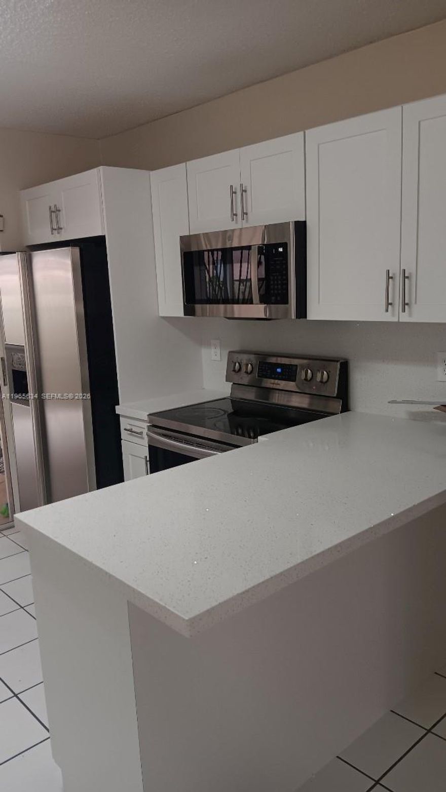 RARELY AVAILABLE FIRST FLOOR 2/2 UNIT* HUGE COVERED BACK PATIO* IN COMPLEX THAT IS CURRENTLY BEING PAINTED* NEW WHITE SHAKER KITCHEN CABINETS AND QUARTZ COUNTERTOPS* NEW MICROWAVE AND OVER-SIZED STAINLESS STEEL SINK* LARGE 2-DOOR FRIDGE WITH ICE MACHINE* SPACE FOR BREAKFAST STOOLS* NEW VERTICAL BLINDS ON PATIO SLIDERS*  SPACIOUS PANTRY* FULL SIZED WASHER AND DRYER IN UNIT* NEW BATHROOM CABINETS WITH QUARTZ TOPS* FRESHLY PAINTED* NEW BACK FENCE COMING SOON* WALKING DISTANCE TO NAVARRO, DON PAN & SEDANO'S*  EASY TO SEE- ON LOCKBOX*  RAPID RESPONSE FROM ASSOCIATION* EXCELLENT LANDLORD* (MORE PHOTOS TO FOLOW)