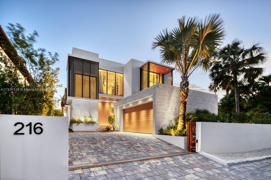 Recently completed and perfectly set on one of the most private waterfront lots in Palm Island, this modern gem is the epitome of Miami Beach living. Boasting 6 beds & 6/1 baths perfectly spread over almost 5,000 SF of living 
area. Features include glass elevator, floating staircase & ample natural light throughout. The chef’s kitchen is an epicurean delight w top-of-the-line appliances, gas stove & breathtaking water views. Entertaining areas abound indoors or out, by the pool/outdoor kitchen or on the rooftop terrace enjoying spectacular skyline views. With 24-hour police security & steps away from the park, community basketball & tennis courts, this masterpiece provides the utmost in location & privacy while being only minutes from S Beach, Downtown & Miami International Airport.