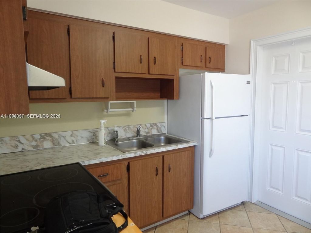 Photo of 2212 Johnson St #2212, Hollywood, FL 33020 (MLS # A11994031)