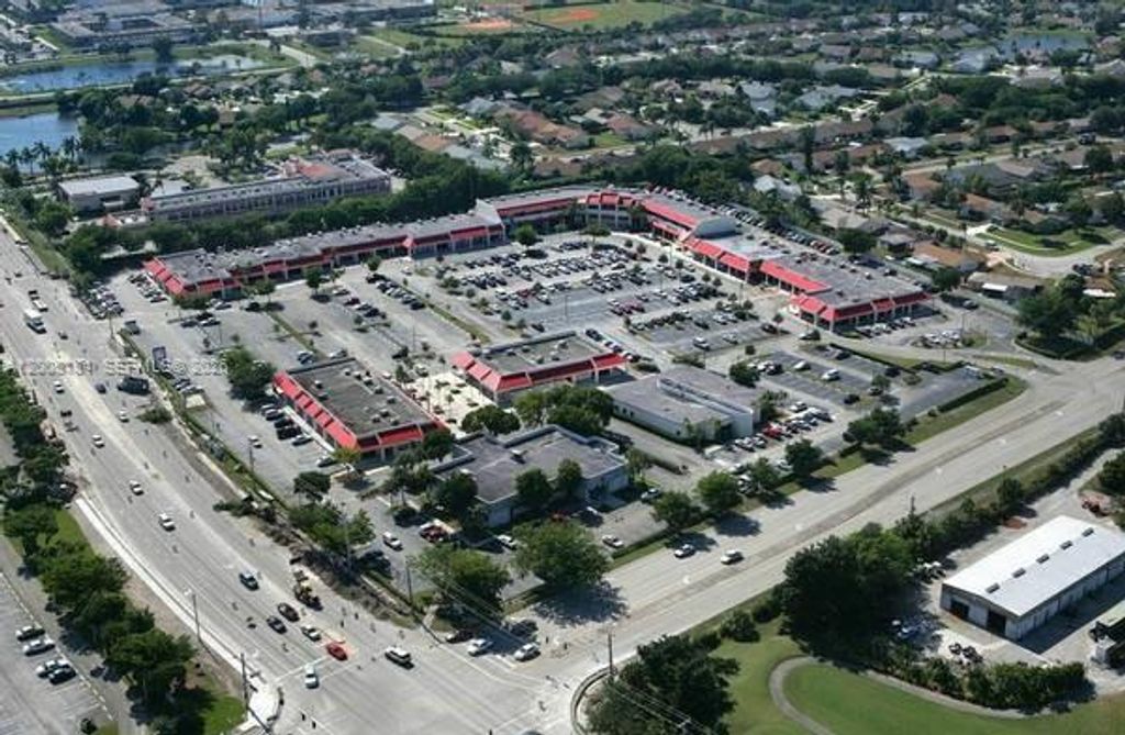 Photo of 9080 Kimberly Blvd #1-4, Boca Raton, FL 33434 (MLS # A12008184)
