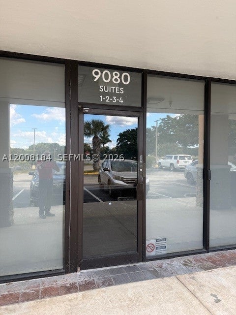 Photo of 9080 Kimberly Blvd #1-4, Boca Raton, FL 33434 (MLS # A12008184)