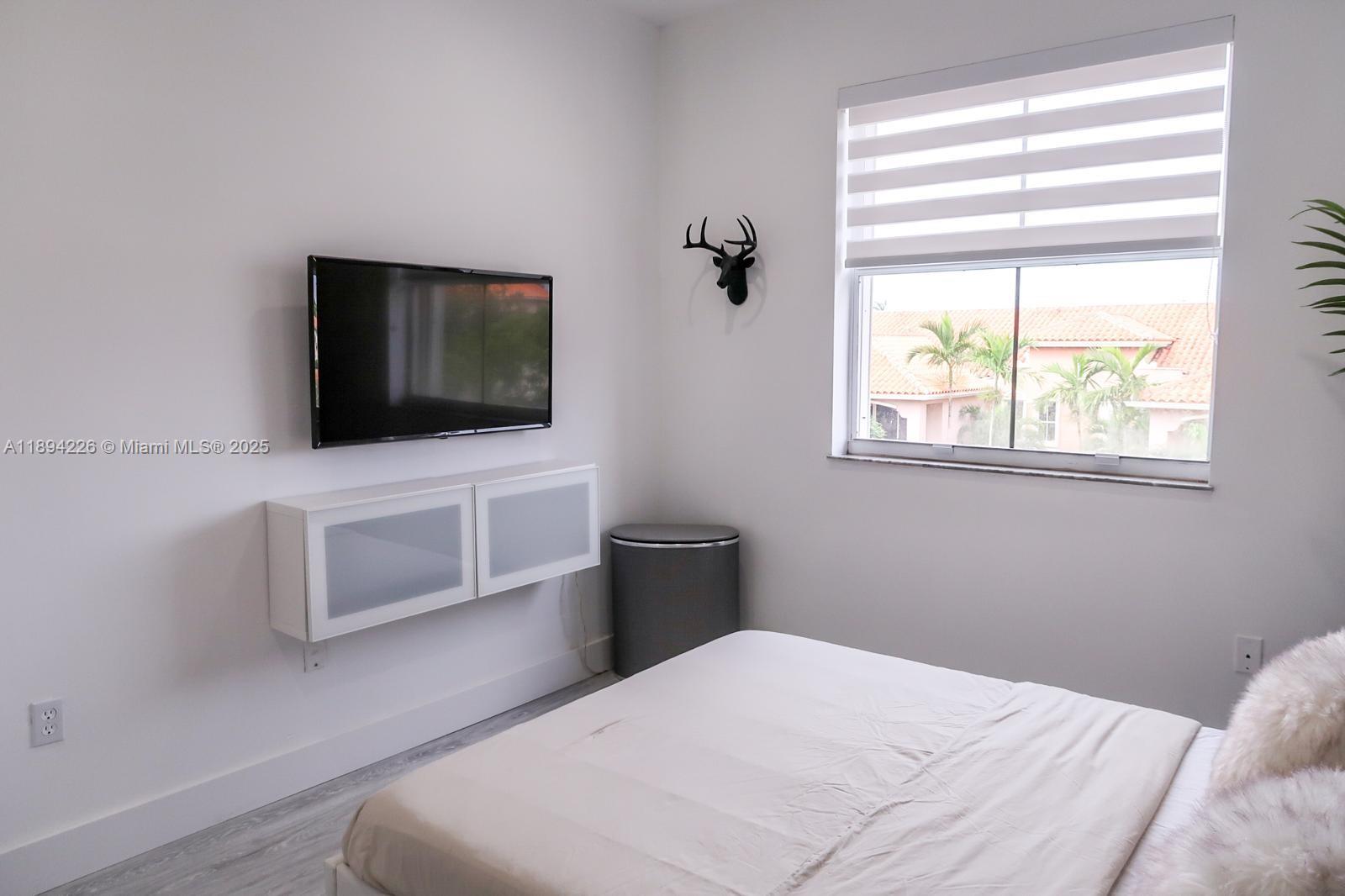 THE COURTS AT DORAL ISLES - Residential Lease