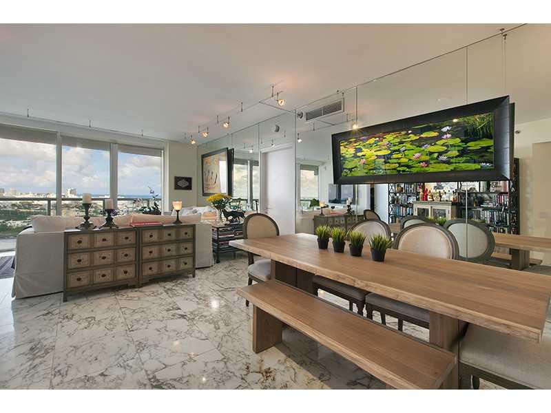 Outstanding high floor "10 line" w/over 700 sqft of wraparound balcony. NE cor unit w/direct Ocean, Miami Beach & Downtown views. Upgraded baths, gorgeous marble floors throughout, Sub-Zero refrigerator, Miele appliances & updated open kitchen. State-of-t he-art amenities include: Exquisite large gym, massage rooms, steam, sauna, billiard room, swimming & lounge pools. Philippe Starck designed lobby, Gym/Spa, & all common areas; "Dolce" authentic Florentine Restaurant. 24hr security & valet service.