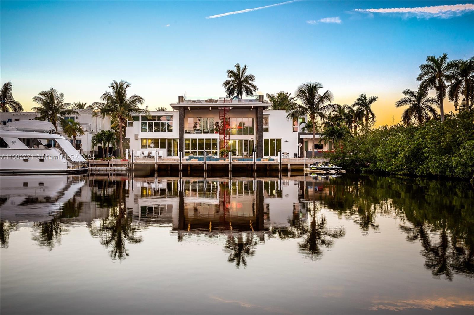 This luxurious and stunning property has 7 beds & 7.5 baths in Las Olas. This gorgeous home was designed with modern luxury in mind and has Italian furniture throughout the interior. Top-of-line chef’s kitchen, gas fireplaces, an elevator, a pristine theatre room, and beautiful ceramic white flooring. This estate comes with access to the intercoastal with a large dock that can accommodate any size vessel up to 90’. This home is within walking distance of restaurants and the beach. This home is the most luxurious property offering all the modern features of impact windows, motorized blinds, multiple AC units, two stoves, and a dishwasher. Outside, enjoy breathtaking views along the outdoor oasis with a beautiful rooftop deck with artificial grass. Owner is offering incentives.
