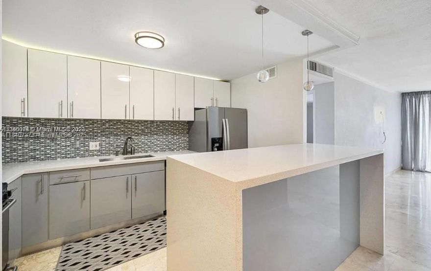 Experience unobstructed southern bay views from this spacious 1 bed, 1.5 bath + den in the coveted "H" line at Brickell Biscayne. This high-floor residence features a beautifully renovated kitchen with sleek cabinetry, stainless steel appliances, and quartz countertops. The flexible den is ideal for a home office or guest area. Enjoy floor-to-ceiling windows, ample natural light, and a private balcony overlooking the bay. Well-maintained building with pool, gym, and secure entry. Prime Brickell location with easy access to downtown, Key Biscayne, and I-95