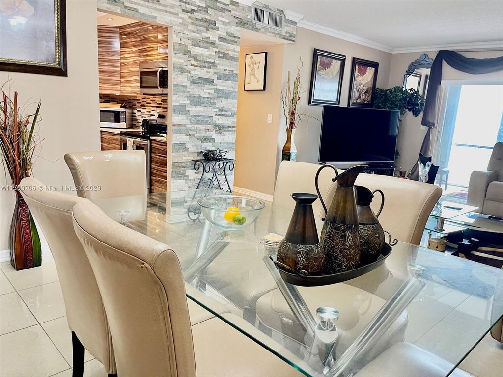 Photo of 4200 Hillcrest Dr #902, Hollywood, FL 33021 (MLS # A11393706)