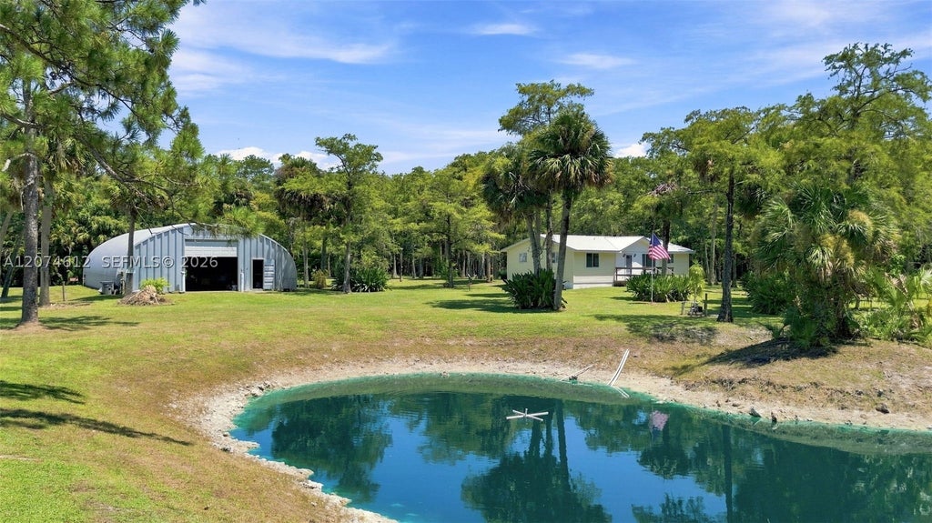 Photo of 5108 N 206th Ter N, Loxahatchee, FL 33470 (MLS # A12074612)