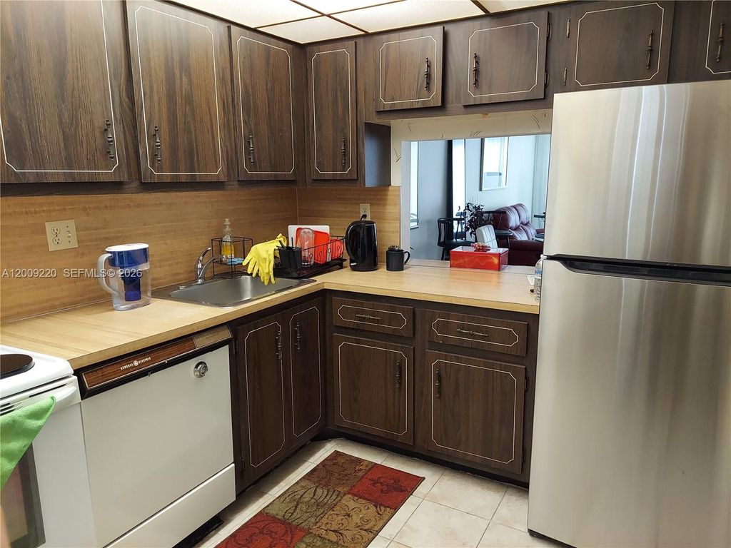 Photo of 8310 Sands Point Blvd #L305, Tamarac, FL 33321 (MLS # A12009220)
