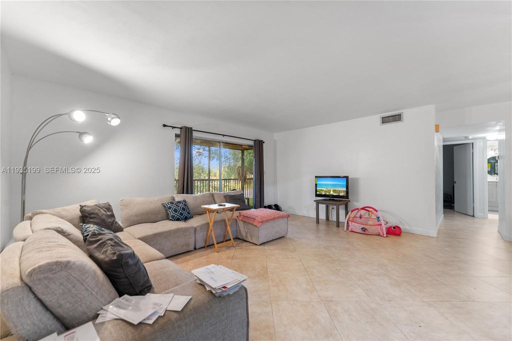 Photo of 3021 N Oakland Forest Dr #208, Oakland Park, FL 33309 (MLS # A11935199)