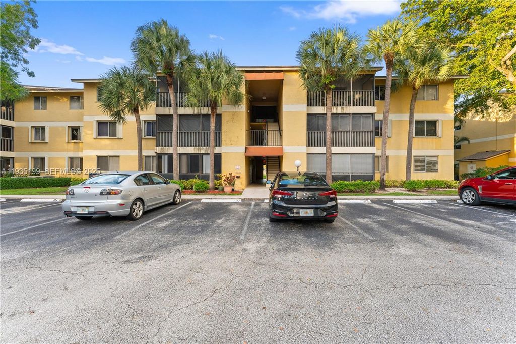 Photo of 3021 N Oakland Forest Dr #208, Oakland Park, FL 33309 (MLS # A11935199)
