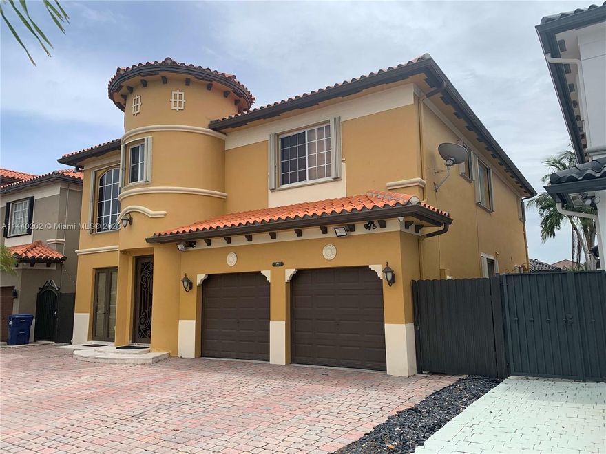 Ready to move in, Freshly Painted, Updated Features in this elegant 5-bed, 4-bath Miami gem with high ceilings and a spacious kitchen featuring stainless steel appliances. This home offers a two-car garage, ample parking, and beautiful tile floors throughout. Updated bathrooms and built-in closets. Conveniently located in Miami's vibrant community, it's an ideal blend of modern comfort and style, perfect for those who appreciate space and a touch of luxury in the heart of the city.