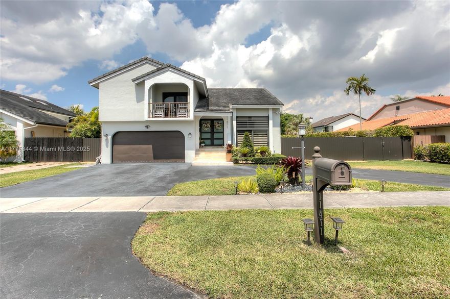 Just Listed! Stunning 2-story fully renovated home featuring 4 bedrooms and 3 bathrooms (1 of the bedrooms and 1 bathroom are located on first floor). Open modern kitchen with quartz counters and stainless-steel appliances. Impact windows and doors plus accordion shutters. Roof is only 6 yrs old. Tiled garage, wood floors upstairs. Master suite with private balcony. Huge attic with wood floors, lights, and ventilation, running full length of home. Backyard oasis with pool and large covered terrace perfect for relaxing or entertaining. Permitted 20x10 ft trailer with A/C-ideal for gym, office, etc. EV-ready circular driveway. Option to buy fully furnished. Centrally located close to Miami Dade College, parks, shopping, and top-rated schools.