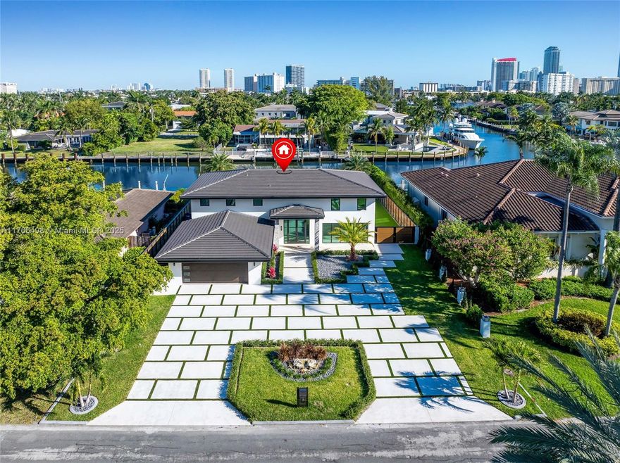 Discover your next home in the exclusive Golden Isles community, with a beautiful canal view and polished concrete entry. Luxury renovations with high quality,Spacious rooms with wood closets designed and installed by Ocean Design Gallery. New impact doors and windows feature fine 40x40 Spanish white porcelain tiles.The kitchen has been remodeled with new kitchen cabinets and Kobe Barenia wood veneer/Graffito wood veneer.Modern Spanish-made cabinetry designed and installed by Ocean Design Gallery. The island and countertops are in polished Calacatta Black quartz stone.New dock for 80 ft
All appliances are MIELE.New tile roof,new landscaping,completely remodeled pool with salt water system, and new dock. Ready for its new owner.