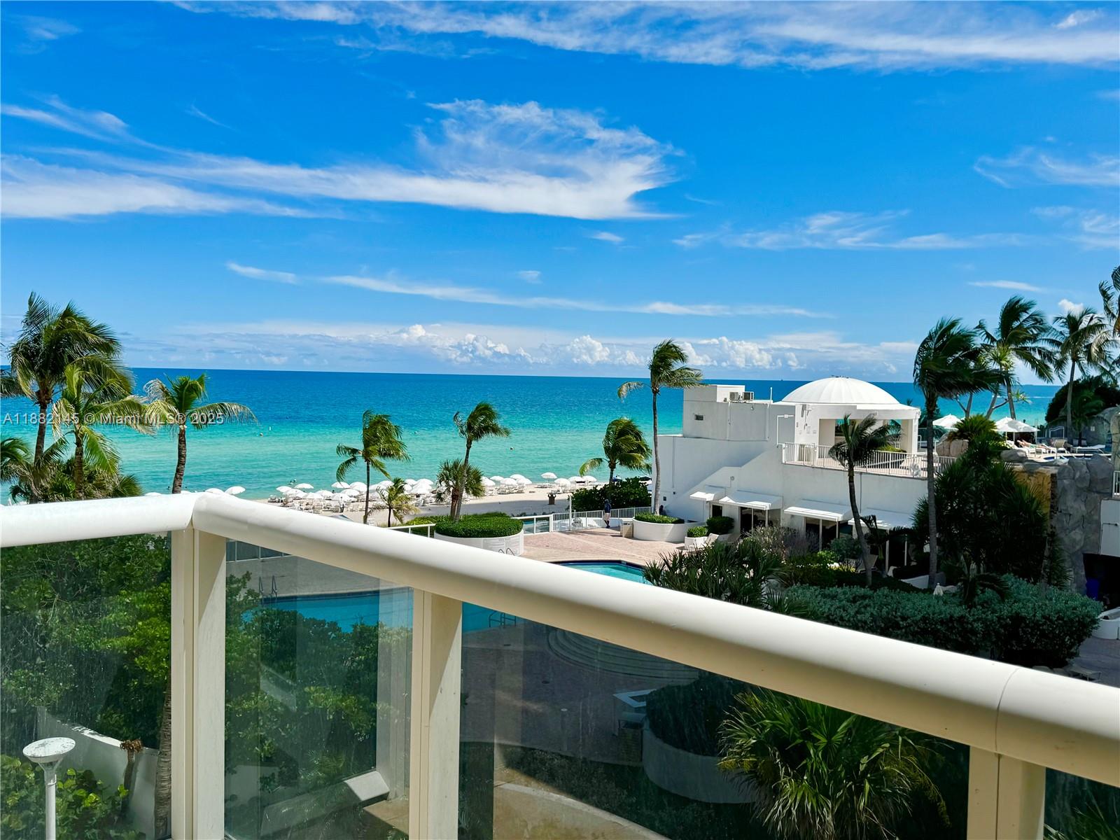 Oceanfront Trump Palace Sunny Isles Beach, 2/2.5 offers ocean and pool view. Porcelain floor. Ocean, beach, tennis court, dog park, gated entry with a 24-hour attendant; a two-story lobby, two lagoon pools Jacuzzies, 8,000-square-foot spa - fitness center with saunas, steam rooms, massage room, classes. Kids room, mini business center, coffee:). Professional Concierge Service, Valet parking. Oceanfront oasis, complete with its own private and pristine beach and grotto-style pool Beach service - chairs, towels. Trump International Hotel is next door with a few restaurants. Publix, school, shops and more just across the road. Maintenance $2,237/month