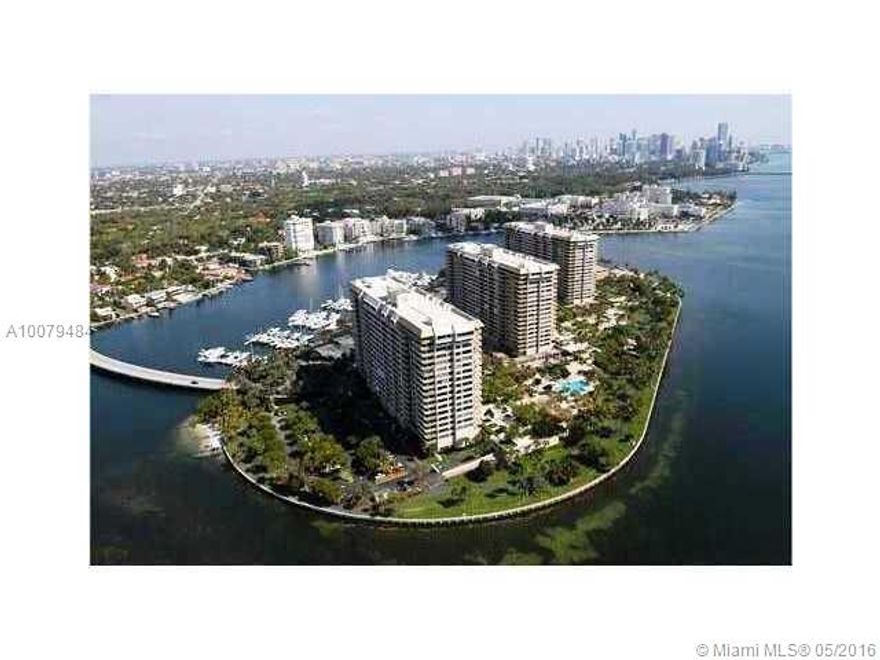 Breathtaking views from this corner unit, overlooking open bay, Key Biscayne, Coconut Grove, Coral Gables & Downtown Miami. Open granite kitchen with top of the line appliances, with white porcelain on social areas, carpet on bedrooms. The best amenities: marina, tennis, pool, spa. Grove Isle Club membership required.