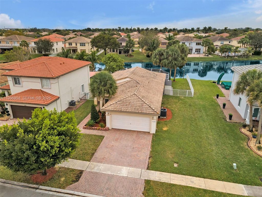 Photo of 13324 SW 44th St, Miramar, FL 33027 (MLS # A11956904)