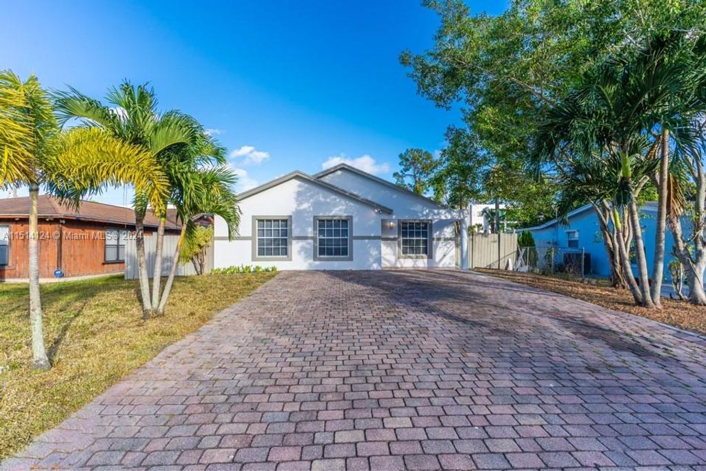 Photo of 3824 Patio Ct, Lake Worth, FL 33461 (MLS # A11514124)